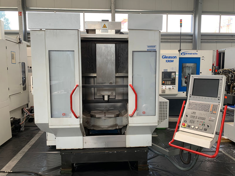 total view on CNC 5-axis machining centre HERMLE C 30 U built 2004 with NC swivel rotary table